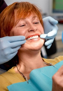 a patient receiving dentures near Brentwood