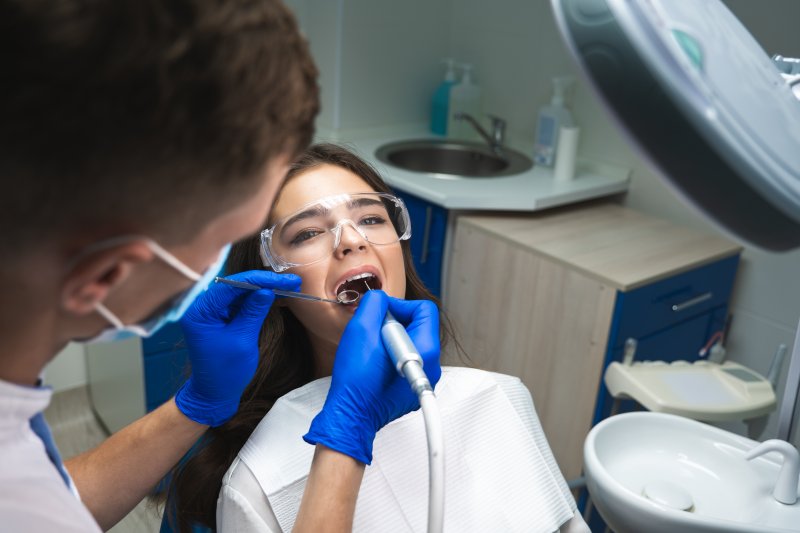 A dentist performing a root canal